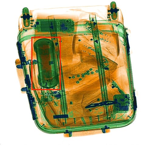 TSA CBT Test X-ray: examples of pipe bomb hidden in a baggage (example)