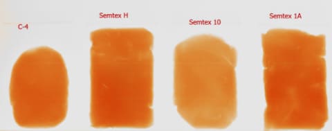 Plastic explosives appear orange in X-ray images: C-4, Semtex H, Semtex 10, Semtex 1A (example)